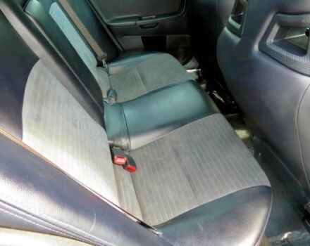 Белый Мицубиси Лансер Эволюшн, объемом двигателя 2 л и пробегом 86 тыс. км за 9900 $, фото 10 на Automoto.ua