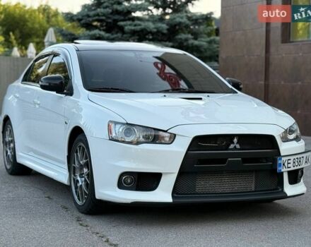 Белый Мицубиси Лансер Эволюшн, объемом двигателя 2 л и пробегом 110 тыс. км за 21500 $, фото 14 на Automoto.ua