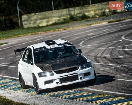 Білий Міцубісі Лансер Еволюшн, об'ємом двигуна 2 л та пробігом 20 тис. км за 37000 $, фото 1 на Automoto.ua