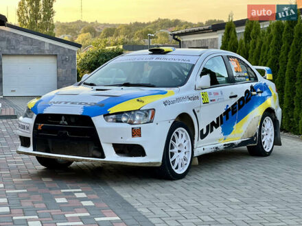 Мицубиси Лансер Эволюшн 2009 в Черновцах на Automoto.ua Белый Мицубиси Лансер Эволюшн, объемом двигателя 2 л и пробегом 107 тыс. км за 59272 $, фото 1 на Automoto.ua