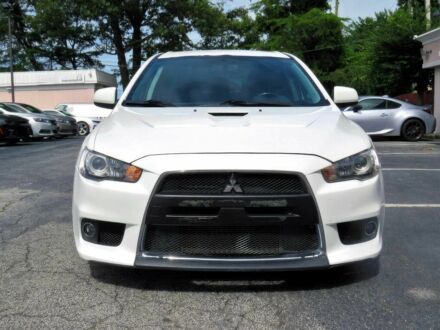 Белый Мицубиси Лансер Эволюшн, объемом двигателя 2 л и пробегом 86 тыс. км за 9900 $, фото 1 на Automoto.ua