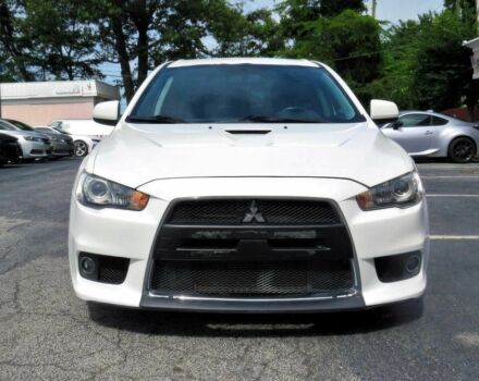 Белый Мицубиси Лансер Эволюшн, объемом двигателя 2 л и пробегом 86 тыс. км за 9900 $, фото 1 на Automoto.ua