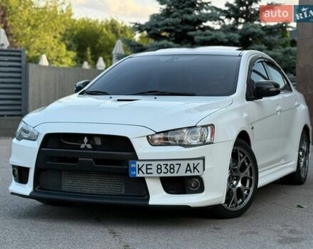 Білий Міцубісі Лансер Еволюшн, об'ємом двигуна 2 л та пробігом 110 тис. км за 21500 $, фото 1 на Automoto.ua