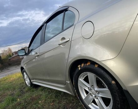 Бежевый Мицубиси Лансер Эволюшн, объемом двигателя 2 л и пробегом 155 тыс. км за 6950 $, фото 3 на Automoto.ua