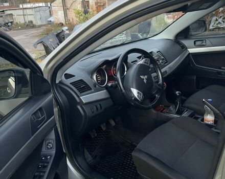 Бежевый Мицубиси Лансер Эволюшн, объемом двигателя 2 л и пробегом 155 тыс. км за 6950 $, фото 11 на Automoto.ua