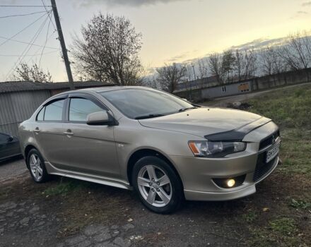 Бежевый Мицубиси Лансер Эволюшн, объемом двигателя 2 л и пробегом 155 тыс. км за 6950 $, фото 5 на Automoto.ua