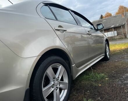 Бежевый Мицубиси Лансер Эволюшн, объемом двигателя 2 л и пробегом 155 тыс. км за 6950 $, фото 7 на Automoto.ua