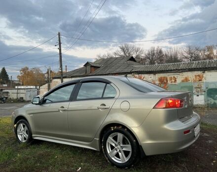 Бежевый Мицубиси Лансер Эволюшн, объемом двигателя 2 л и пробегом 155 тыс. км за 6950 $, фото 2 на Automoto.ua