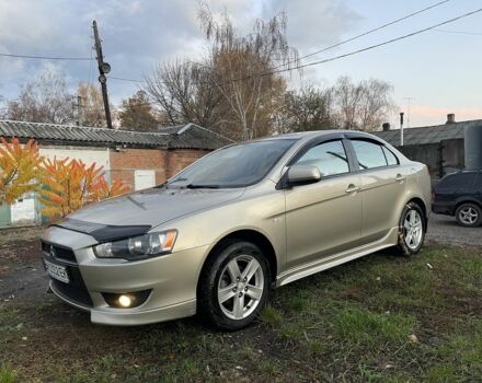 Бежевый Мицубиси Лансер Эволюшн, объемом двигателя 2 л и пробегом 155 тыс. км за 6950 $, фото 1 на Automoto.ua