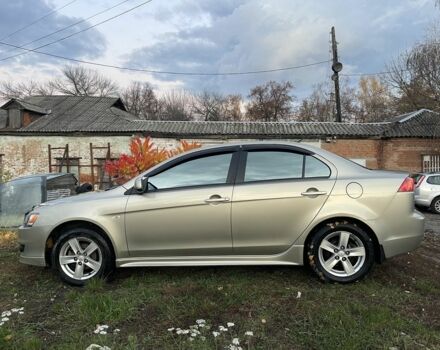 Бежевый Мицубиси Лансер Эволюшн, объемом двигателя 2 л и пробегом 155 тыс. км за 6950 $, фото 1 на Automoto.ua