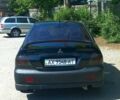 Черный Мицубиси Лансер Эволюшн, объемом двигателя 2 л и пробегом 140 тыс. км за 8000 $, фото 4 на Automoto.ua