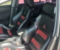 Черный Мицубиси Лансер Эволюшн, объемом двигателя 2 л и пробегом 140 тыс. км за 8000 $, фото 8 на Automoto.ua