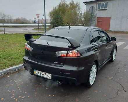 Черный Мицубиси Лансер Эволюшн, объемом двигателя 2 л и пробегом 116 тыс. км за 16900 $, фото 4 на Automoto.ua