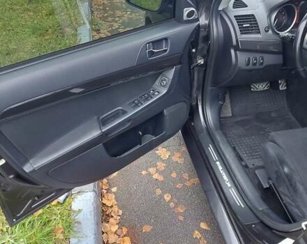 Черный Мицубиси Лансер Эволюшн, объемом двигателя 2 л и пробегом 116 тыс. км за 16900 $, фото 13 на Automoto.ua