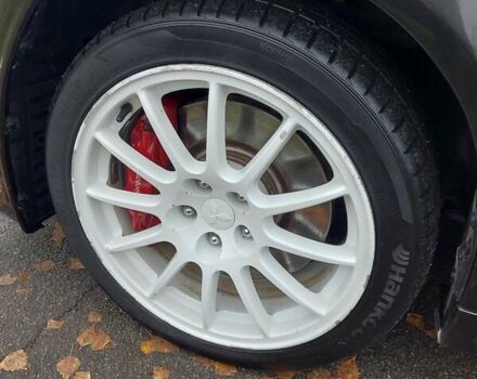 Черный Мицубиси Лансер Эволюшн, объемом двигателя 2 л и пробегом 116 тыс. км за 16900 $, фото 19 на Automoto.ua