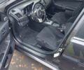 Черный Мицубиси Лансер Эволюшн, объемом двигателя 2 л и пробегом 116 тыс. км за 16900 $, фото 12 на Automoto.ua