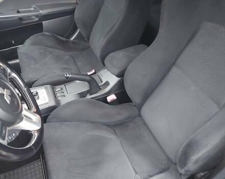 Черный Мицубиси Лансер Эволюшн, объемом двигателя 2 л и пробегом 116 тыс. км за 16900 $, фото 15 на Automoto.ua