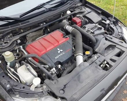 Черный Мицубиси Лансер Эволюшн, объемом двигателя 2 л и пробегом 116 тыс. км за 16900 $, фото 17 на Automoto.ua