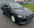 Черный Мицубиси Лансер Эволюшн, объемом двигателя 2 л и пробегом 116 тыс. км за 16900 $, фото 1 на Automoto.ua