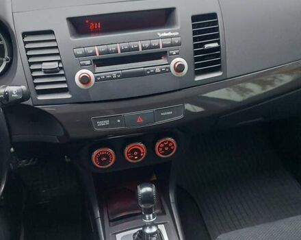 Черный Мицубиси Лансер Эволюшн, объемом двигателя 2 л и пробегом 116 тыс. км за 16900 $, фото 14 на Automoto.ua