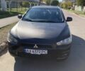 Чорний Міцубісі Лансер Еволюшн, об'ємом двигуна 1.5 л та пробігом 119 тис. км за 5004 $, фото 1 на Automoto.ua