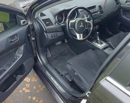 Черный Мицубиси Лансер Эволюшн, объемом двигателя 2 л и пробегом 116 тыс. км за 16900 $, фото 10 на Automoto.ua