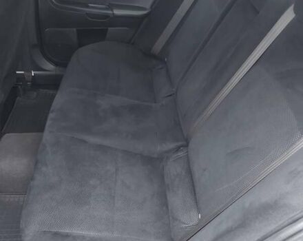 Черный Мицубиси Лансер Эволюшн, объемом двигателя 2 л и пробегом 116 тыс. км за 16900 $, фото 18 на Automoto.ua