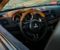 Черный Мицубиси Лансер Эволюшн, объемом двигателя 2 л и пробегом 157 тыс. км за 15500 $, фото 4 на Automoto.ua