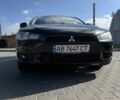 Черный Мицубиси Лансер Эволюшн, объемом двигателя 2 л и пробегом 223 тыс. км за 7600 $, фото 1 на Automoto.ua