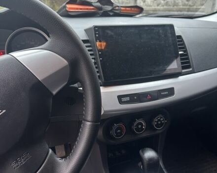 Черный Мицубиси Лансер Эволюшн, объемом двигателя 1.5 л и пробегом 252 тыс. км за 6100 $, фото 5 на Automoto.ua