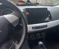 Черный Мицубиси Лансер Эволюшн, объемом двигателя 1.5 л и пробегом 252 тыс. км за 6100 $, фото 5 на Automoto.ua