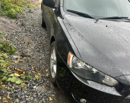 Черный Мицубиси Лансер Эволюшн, объемом двигателя 1.5 л и пробегом 252 тыс. км за 6100 $, фото 4 на Automoto.ua