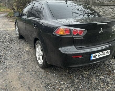 Черный Мицубиси Лансер Эволюшн, объемом двигателя 1.5 л и пробегом 252 тыс. км за 6100 $, фото 3 на Automoto.ua