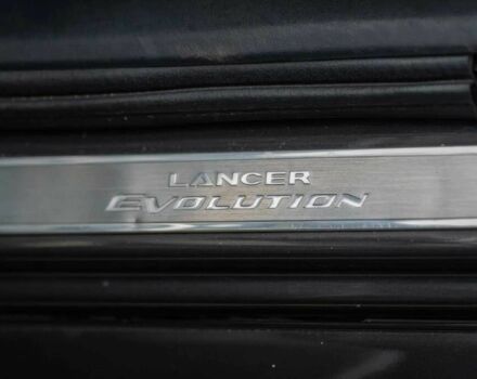 Черный Мицубиси Лансер Эволюшн, объемом двигателя 2 л и пробегом 90 тыс. км за 6400 $, фото 8 на Automoto.ua