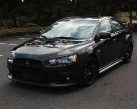 Черный Мицубиси Лансер Эволюшн, объемом двигателя 2 л и пробегом 88 тыс. км за 6400 $, фото 2 на Automoto.ua