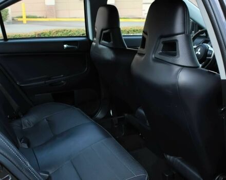 Чорний Міцубісі Лансер Еволюшн, об'ємом двигуна 2 л та пробігом 85 тис. км за 6400 $, фото 16 на Automoto.ua