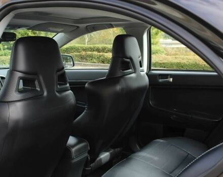 Чорний Міцубісі Лансер Еволюшн, об'ємом двигуна 2 л та пробігом 85 тис. км за 6400 $, фото 14 на Automoto.ua