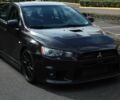Чорний Міцубісі Лансер Еволюшн, об'ємом двигуна 2 л та пробігом 85 тис. км за 6400 $, фото 2 на Automoto.ua