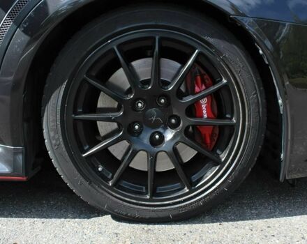 Чорний Міцубісі Лансер Еволюшн, об'ємом двигуна 2 л та пробігом 85 тис. км за 6400 $, фото 19 на Automoto.ua