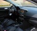 Чорний Міцубісі Лансер Еволюшн, об'ємом двигуна 2 л та пробігом 85 тис. км за 6400 $, фото 12 на Automoto.ua
