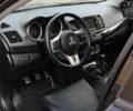 Черный Мицубиси Лансер Эволюшн, объемом двигателя 2 л и пробегом 87 тыс. км за 6400 $, фото 8 на Automoto.ua