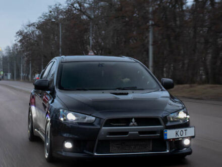 Мицубиси Лансер Эволюшн 2008 в Харькове на Automoto.ua Черный Мицубиси Лансер Эволюшн, объемом двигателя 2 л и пробегом 157 тыс. км за 19800 $, фото 1 на Automoto.ua