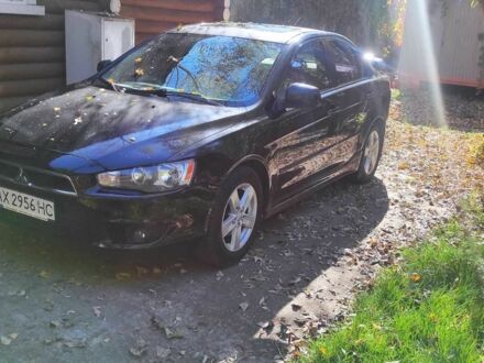 Чорний Міцубісі Лансер Еволюшн, об'ємом двигуна 1.5 л та пробігом 220 тис. км за 5900 $, фото 1 на Automoto.ua