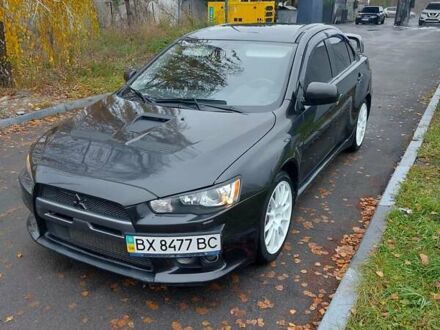 Черный Мицубиси Лансер Эволюшн, объемом двигателя 2 л и пробегом 116 тыс. км за 16900 $, фото 1 на Automoto.ua