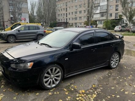 Чорний Міцубісі Лансер Еволюшн, об'ємом двигуна 2 л та пробігом 180 тис. км за 5506 $, фото 1 на Automoto.ua
