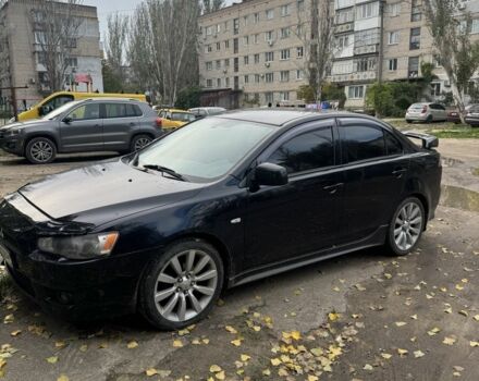 Чорний Міцубісі Лансер Еволюшн, об'ємом двигуна 2 л та пробігом 180 тис. км за 5506 $, фото 1 на Automoto.ua