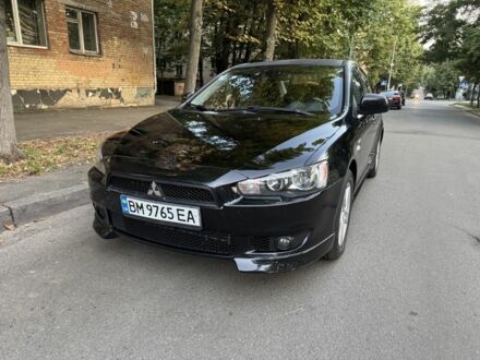 Мицубиси Лансер Эволюшн 2008 в Киеве на Automoto.ua Черный Мицубиси Лансер Эволюшн, объемом двигателя 2 л и пробегом 202 тыс. км за 5700 $, фото 1 на Automoto.ua