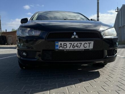 Чорний Міцубісі Лансер Еволюшн, об'ємом двигуна 2 л та пробігом 223 тис. км за 7000 $, фото 1 на Automoto.ua