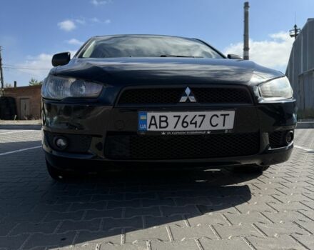 Чорний Міцубісі Лансер Еволюшн, об'ємом двигуна 2 л та пробігом 223 тис. км за 7000 $, фото 1 на Automoto.ua
