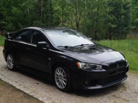 Міцубісі Лансер Еволюшн 2014 у Львові на Automoto.ua Чорний Міцубісі Лансер Еволюшн, об'ємом двигуна 2 л та пробігом 150 тис. км за 7200 $, фото 1 на Automoto.ua